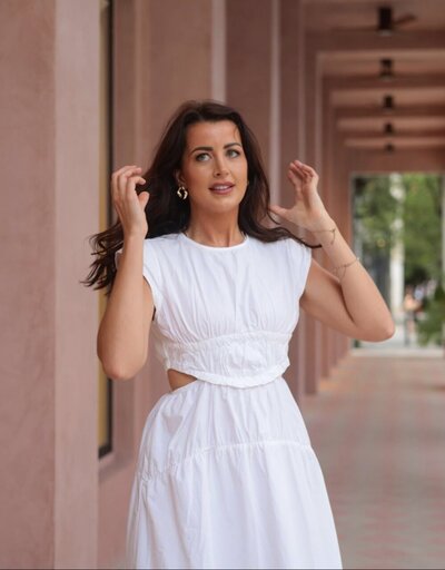 Amy kelly coaching in her fun moment playing with her hair.