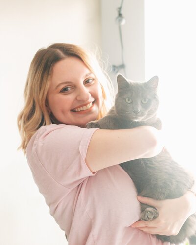 The Owner of Studio Broad, Claudia, with her cat