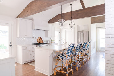 Kitchen view of a home with an open floor plan and large beams in Dallas