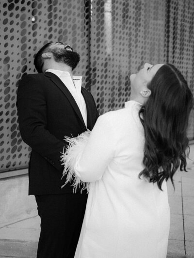 Bride and groom walk up memorial steps at their DC wedding
