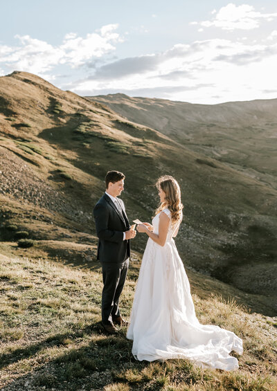 An elopement couple sharing a picnic.