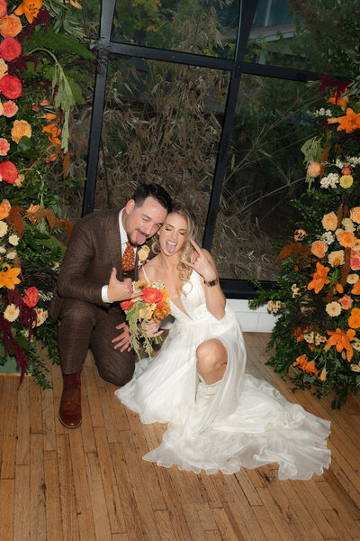 fun and quirky photograph of a bride and groom at their wedding at The Cathedral ATX captured by Texas and Southern California documentary wedding photographer