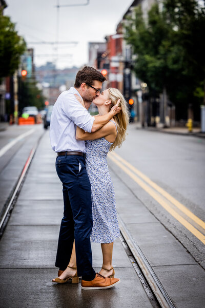 Explore Hailey and Peters ’s vibrant urban engagement session in downtown Cincinnati. Captured amidst the city’s historic architecture, this series highlights their playful and stylish love story, perfect for couples who adore the city buzz.