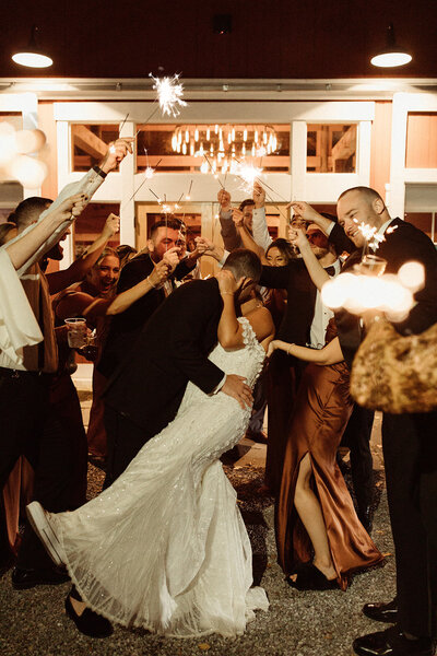 sparkler wedding exit dip at barn wedding venue in Upstate New York