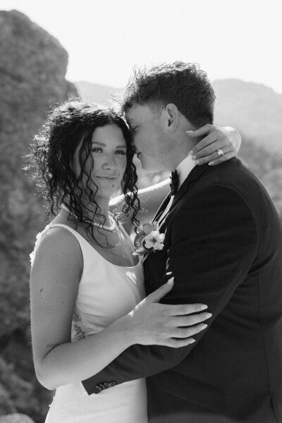 The groom holding his bride at their Keystone, South Dakota elopement.
