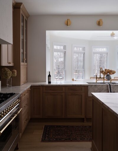 Project image of kitchen with wooden cabinetry and open wall concept, by Alexa at Home