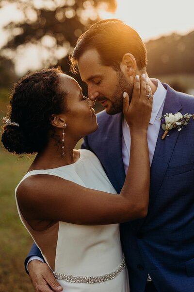 groom holding bride