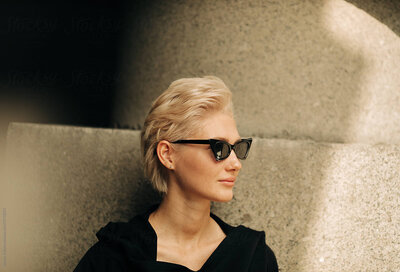fashionable woman wearing black cat eye sunglasses