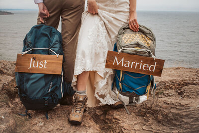 couple with boots and backpacks