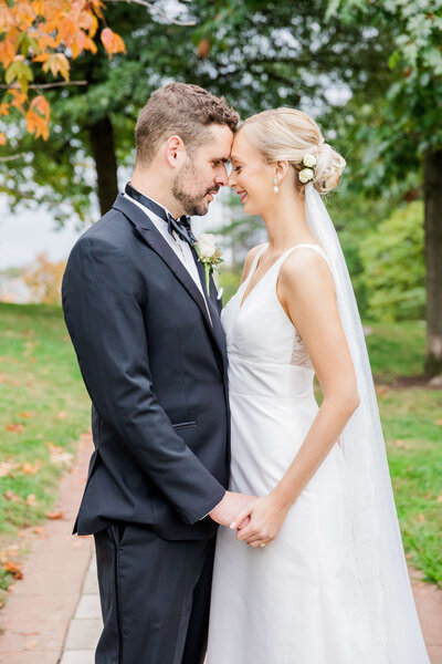 Bride and Groom stand facing each other in Eden Park in Cincinnati Ohio