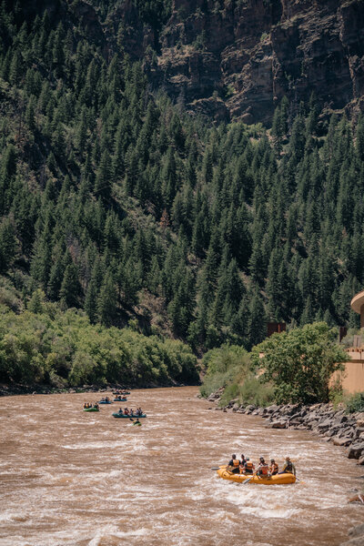 Couples wedding guests float down the river during their wedding weekend in Glenwood Springs. 