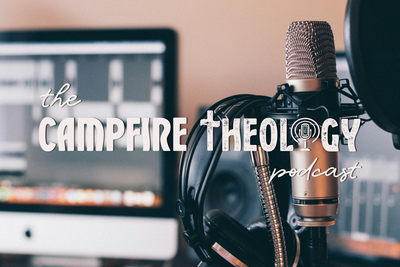 Podcast microphone hold up a pair of headphone in what seems to be a podcast recording studio with a blurred Mac desktop. The word mark logo Campfire Theology is shown.