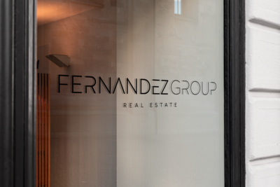 real estate logo on a glass window.