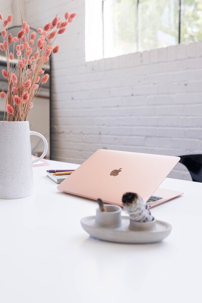 a laptop computer and a cup of coffee