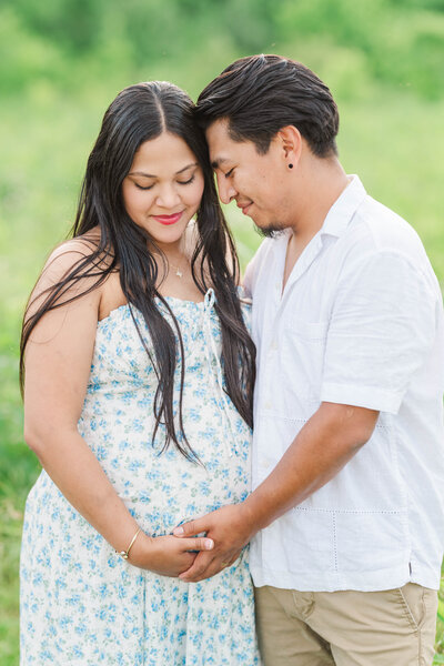 Bride and groom embrace during their wedding portraits at The Jim Beam Distillery