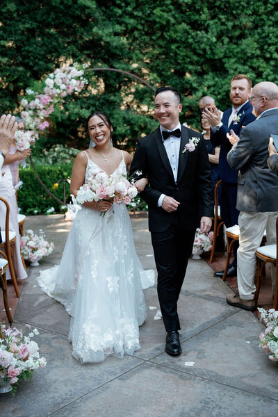 radiant-love-event-outdoor-reception-romantic-greenery-bride-groom-dancing-smiling-romantic-elegant-timeless