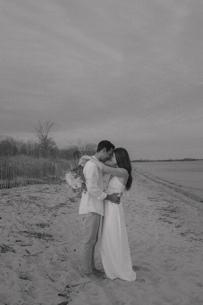 A couple holding each other in their arms as they are about to elope near Annapolis, Maryland