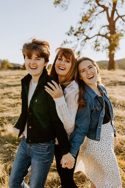 mom and daughters  candid natural fun family photo shoot with adult children, christmas holiday card photo shoot, San Diego portraits photographer, families