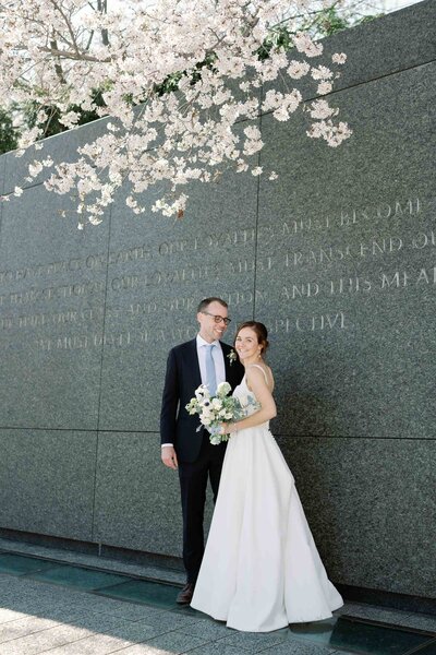 Bride and groom at mlk memorial cherry blossom wedding spring in washington dc