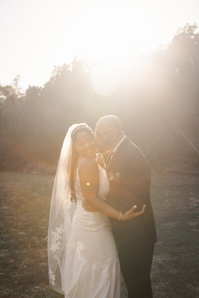 documentary photograph of a bride and groom during golden hour captured by Southern California film wedding photographer