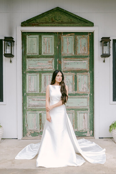 Weddings at the Videre Estate photographed with a modern bride in front of the estate’s vintage green doors by an Austin wedding photographer, Erin Marcin Photography.