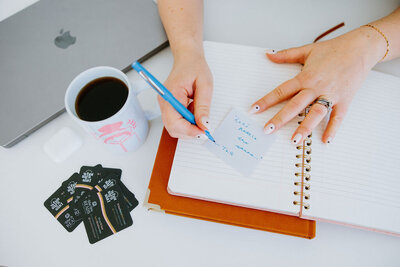 A stack of copywriting supplies on a desk