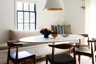 A historic Hingham home featuring modern furniture and custom design by Boston area interior designers, blending tradition with contemporary style. 
