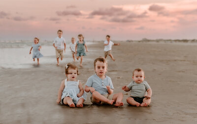 All of the cousins from an extended family photo session came together for some fun and running on the beaches of Corpus Christi, Texas.
