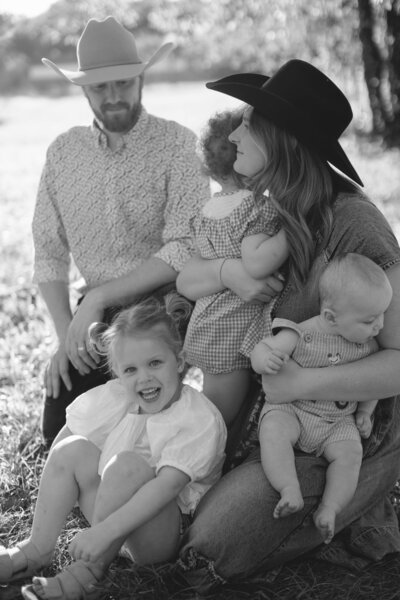 Family photo of Aly Matei wearing a cowboy hat