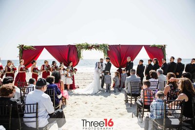 Wedding ceremony taking place on Salt Creek Beach