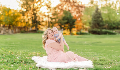 mother and daughter sitting in the grass by york pa photographer