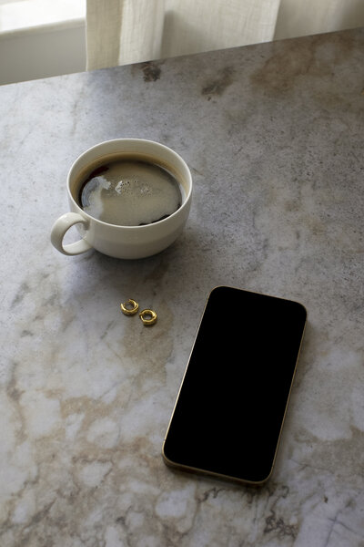 Black coffee and an iPhone.