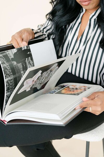 Wedding photographers in Fairfield County CT reviewing portfolio images