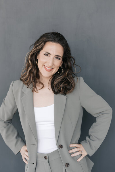 Lifestyle branding headshot with the Philadelphia skyline reflection on the FMC building in University City