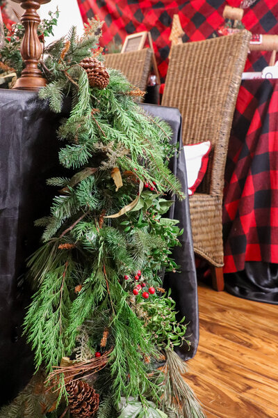 christmas greenery garland event planner nyc table setting red and black