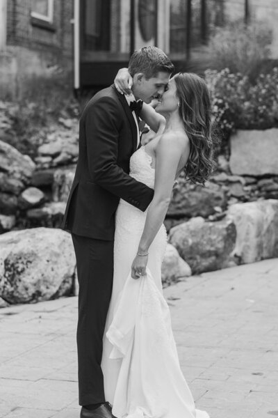 bride and groom share intimate kiss during city winery wedding