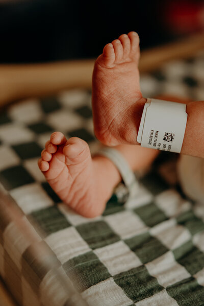 New Mom Holding Newborn Baby