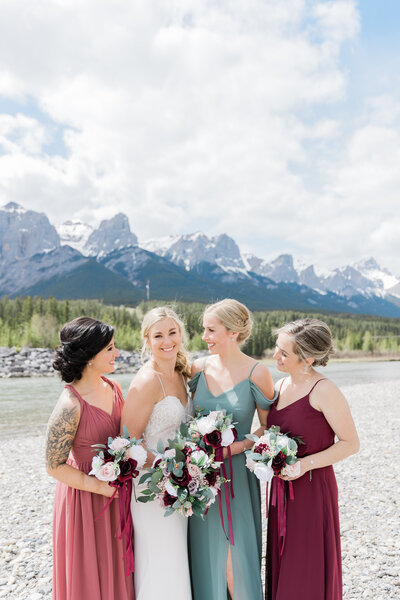 Bride and bridesmaids in the rocky mountains