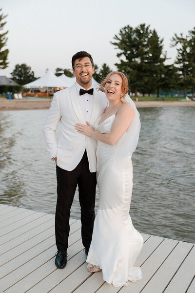 Bride and groom sunset photos at Boyne Mountain Beach House.