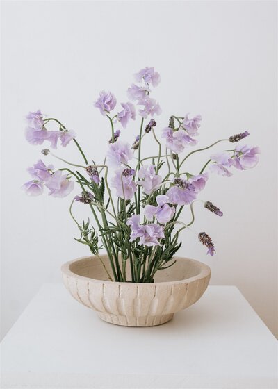 Whimsical and modern purple floral arrangement