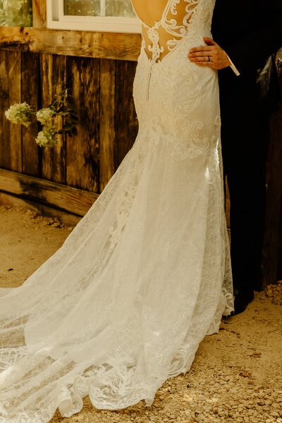 Newlyweds pull each other in close as they share their first moments as husband and wife.