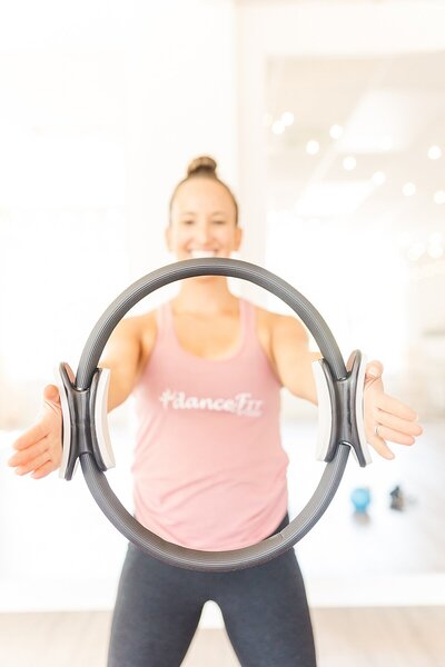 DanceFIT holds exercise equipment during Branding Photo Session with Sara Sniderman Photography in Natick Massachuetts
