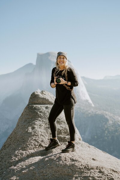 Yosemite elopement photographer standing in front of Half Dome
