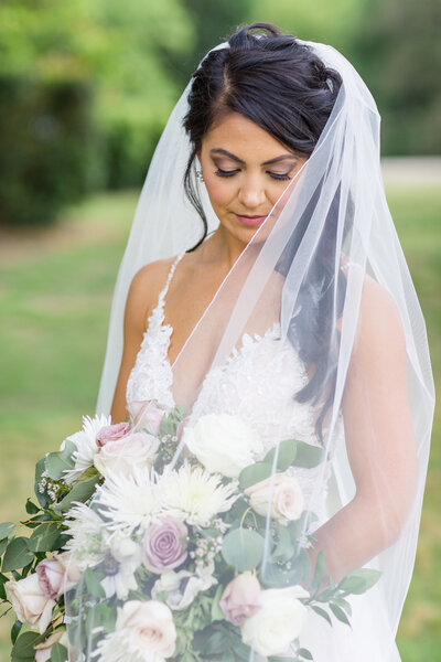 Beautiful mauve and white brides bouquet captured  by Cor Photography.
