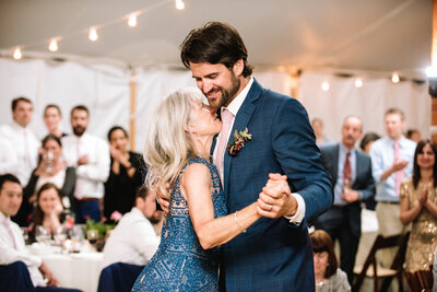 best wedding photographer. Mom and groom first dance