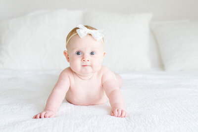 Family of three photo session with a one year old boy, and his parents at the Historic Smithville Mansion . by Renee Ash Photography