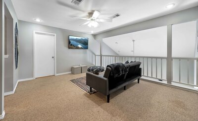 Sleeper sofa for two with Smart TV in this 3-bedroom, 2.5 bathroom lake house with incredible view of Lake Belton located at Morgan's Point, near Rogers Park and Temple Lake Park.