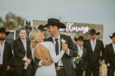 Lodi vineyard details with stetson hat, ariat bridal boots and garden roses.