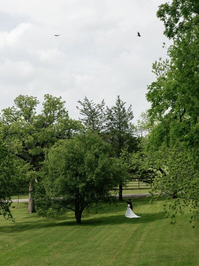Bride and groom sharing a quiet moment seated together after their wedding ceremony.