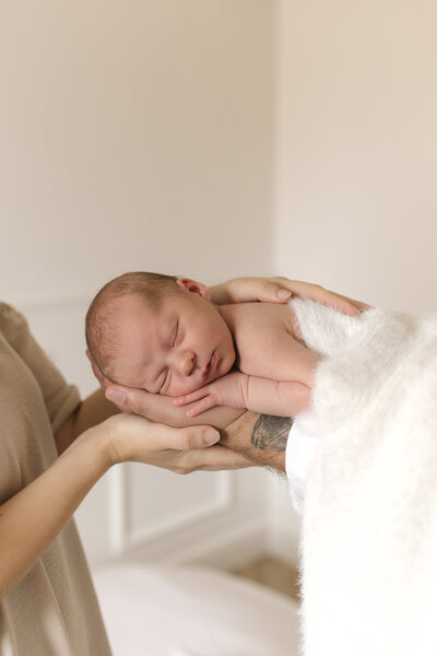 Newborn photography session in Kent by Abigail Scarfe